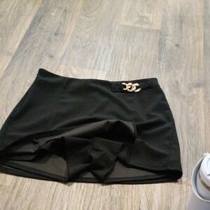 Black Mini Skirt with Gold Chain Accent